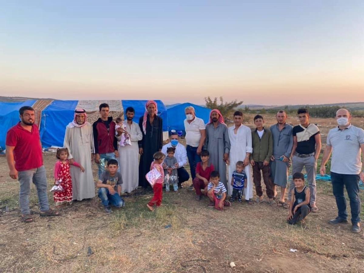 Doğan, iş&ccedil;i &ccedil;adırlarındaki &ccedil;ocuklara oyuncak dağıttı