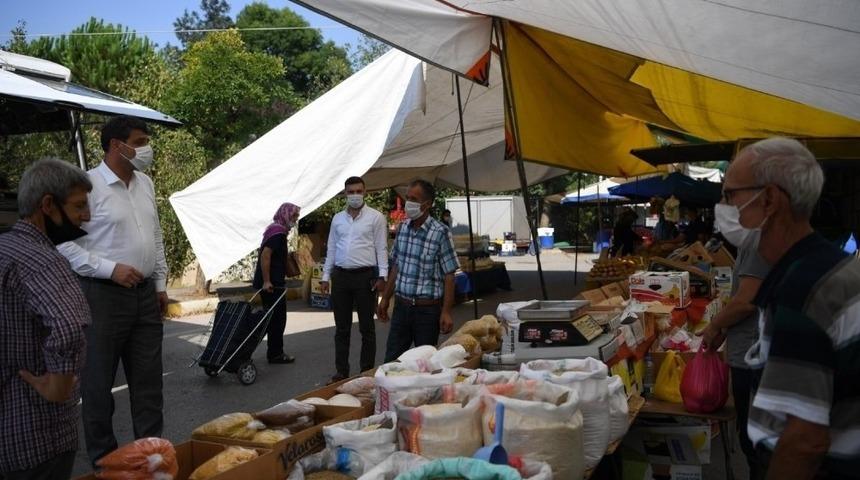 Kocaman pazarda alışveriş yapıp  alınan tedbirleri denetledi