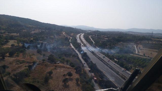 İzmir'de ormanlık alanda çıkan yangın kısmen kontrol altında