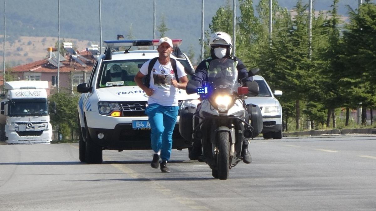 Akın Yeniceli, sokak hayvanları i&ccedil;in 34 km koştu