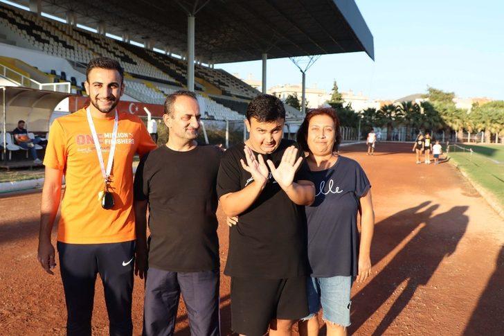 Kuşadalı otizmli genç mücadeleci ruhuyla örnek oluyor G2