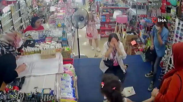 Alışveriş yapmak için gittiği mağazada beğendiği avize kafasına düştü