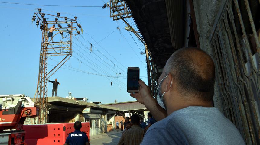 Adana'da elektrik direğinde intihar girişimi! Gören telefona sarıldı
