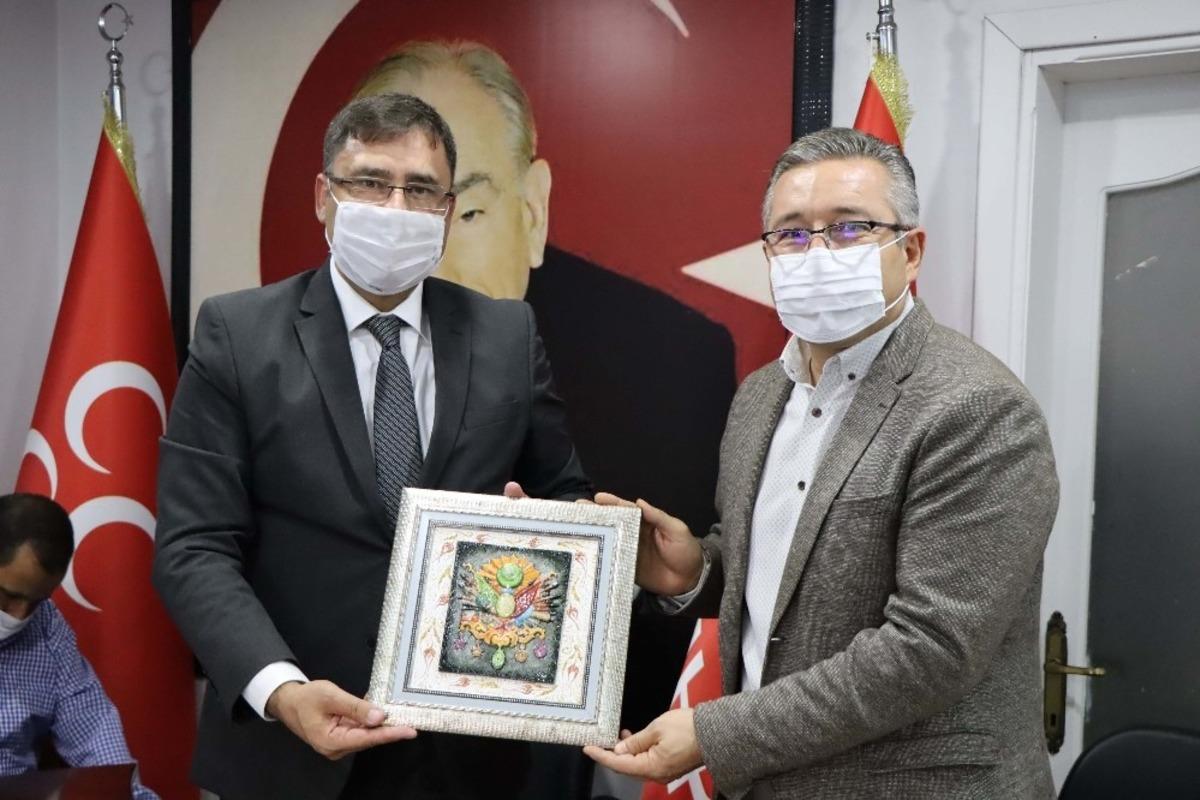 Kuşadası MHP&rsquo;ye AK Parti il&ccedil;e y&ouml;netiminden iadeyi ziyaret