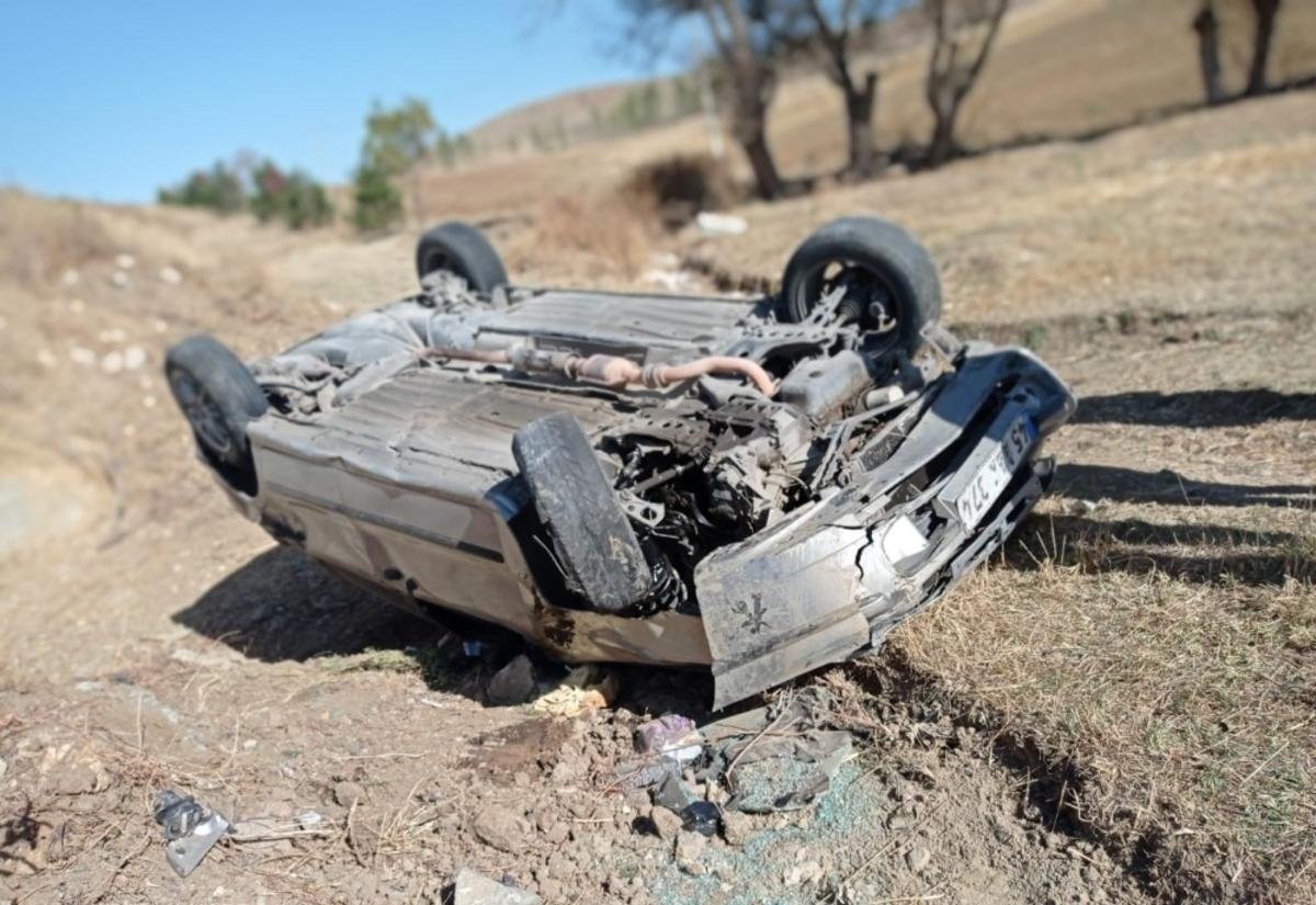 Takla atan otomobilden yara almadan kurtuldu