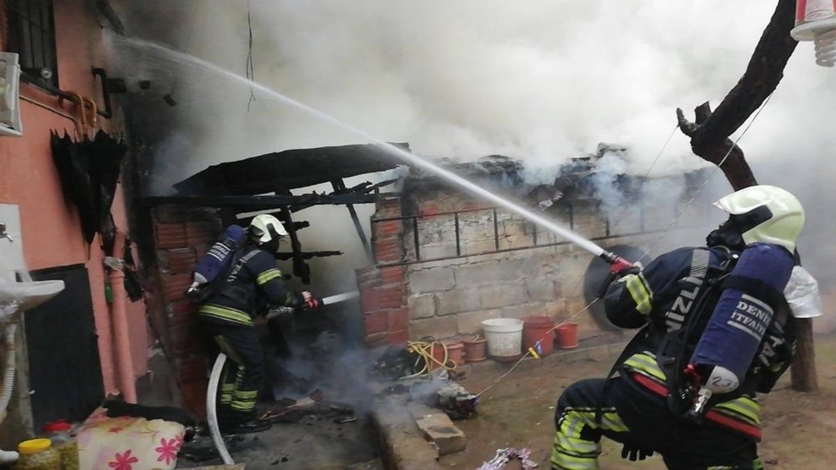 Depoda &ccedil;ıkan yangın iki katlı binaya sı&ccedil;radı