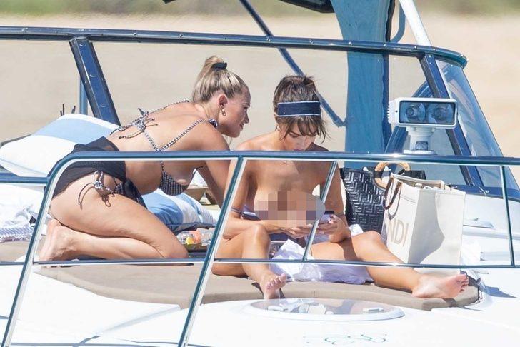 Olivia Culpo teknede üstsüz güneşlendi G2