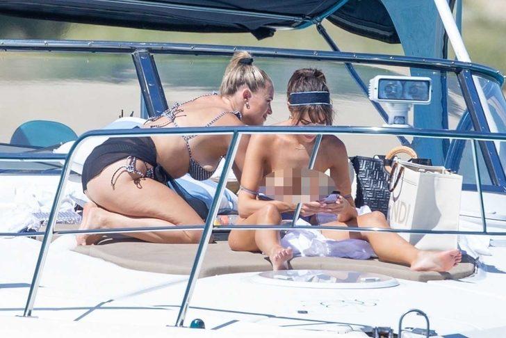 Olivia Culpo teknede üstsüz güneşlendi G3