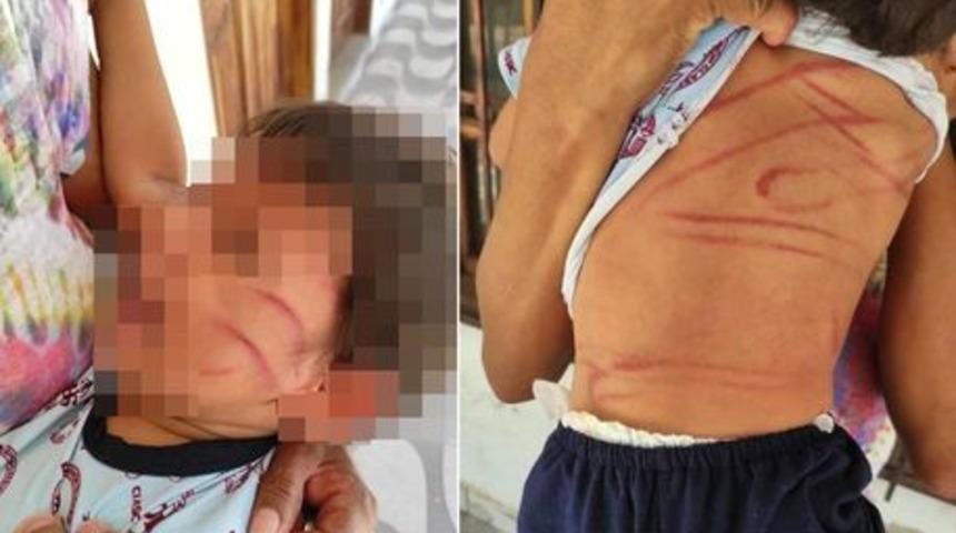 Telefon kılıfını kırdığı için 2 yaşındaki çocuğu kırbaçladı