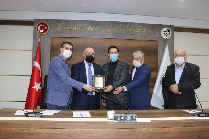 Hayırsever iş adamları ve esnafa plaket G2