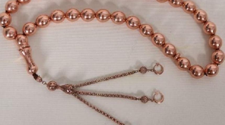 780 gram ağırlığındaki bakır tespih 2 bin dolara satıldı