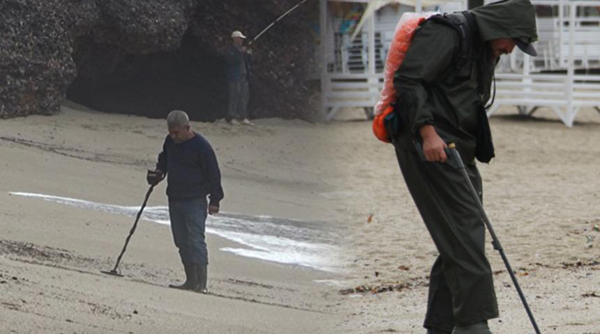 Yer: Antalya! Yağmur sonrası plajlara akın ettiler