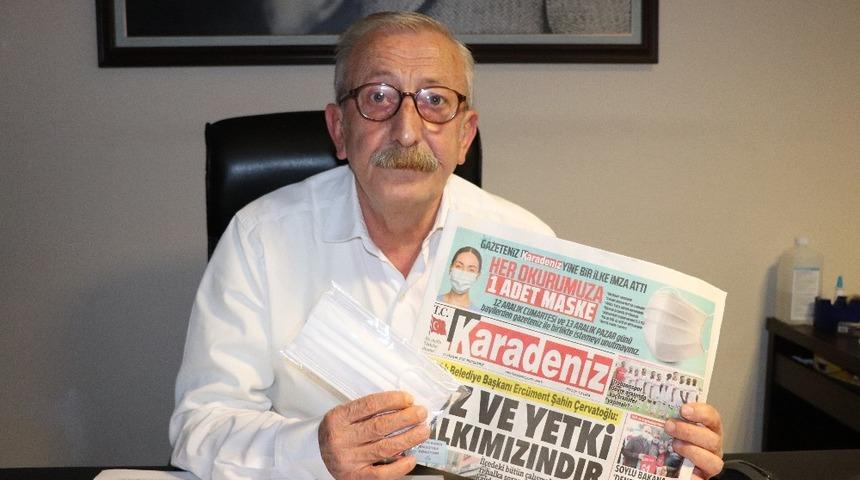 Bir gazete alana bir maske