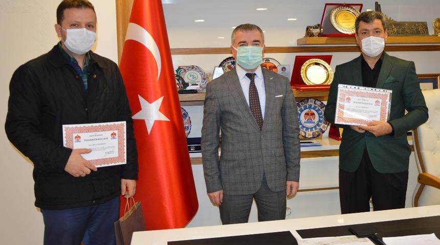 Başkan Özdemir’den gassallara teşekkür belgesi