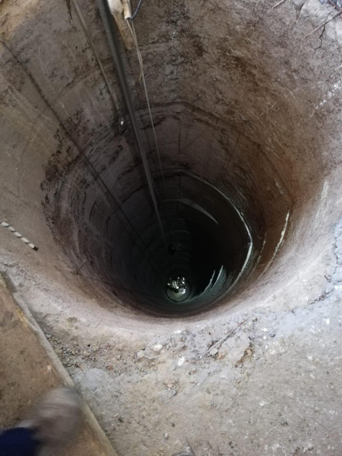 Bah&ccedil;edeki kuyudan duyulan yardım &ccedil;ığlıkları ekipleri harekete ge&ccedil;irdi