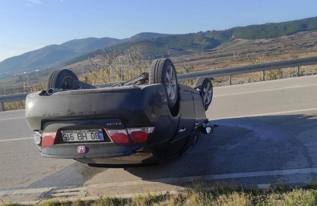 Takla atan otomobilden yaralı kurtuldu