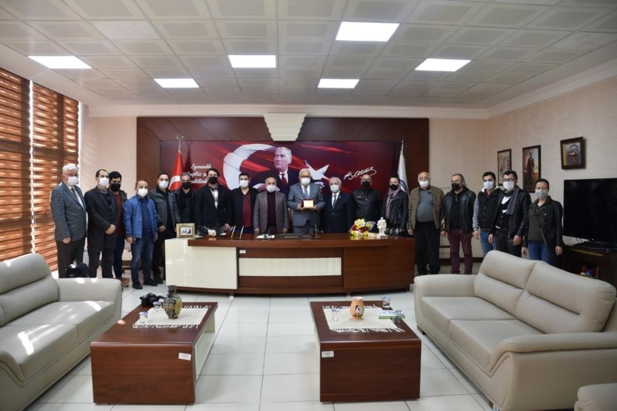 Başkan ve gazetecilerden birliktelik mesajı