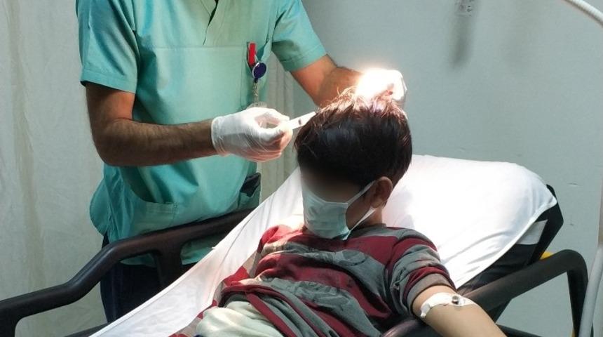 6 yaşındaki çocuk 13 yaşındaki ağabeyini odunla hastanelik etti