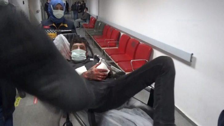 Yarasını unutup sedye üzerinden kameramanı tekmeleyip yumrukladı G1