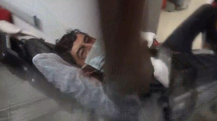 Yarasını unutup sedye üzerinden kameramanı tekmeleyip yumrukladı G2