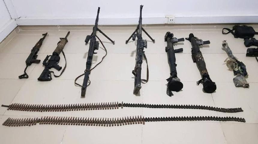 13 sivilin şehit edildiği mağarada teröristlere ait silah ve mühimmat ele geçirildi