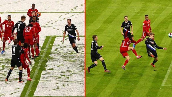 Bayern-Bielefeld maçının ilk yarısında kardan bembeyaz olan saha, ikinci yarıda temizlenerek eski haline getirildi