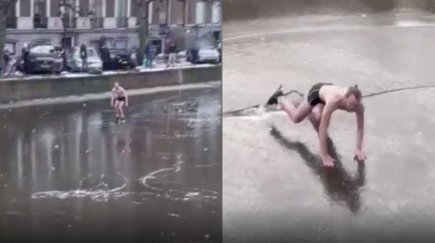 Donmuş kanalda kayak yapan kişi, buz kırılınca suya düştü