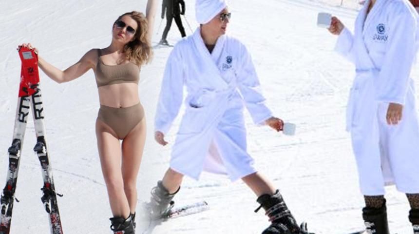 Rus turistler karın keyfini böyle çıkardı! Bornozla kayıp, bikiniyle poz verdiler
