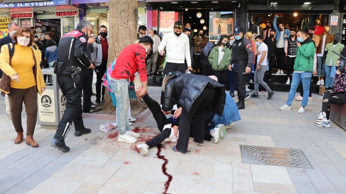 Kentin g&ouml;beğinde bı&ccedil;aklandı, yardımına otob&uuml;s bekleyen sağlık &ccedil;alışanı koştu