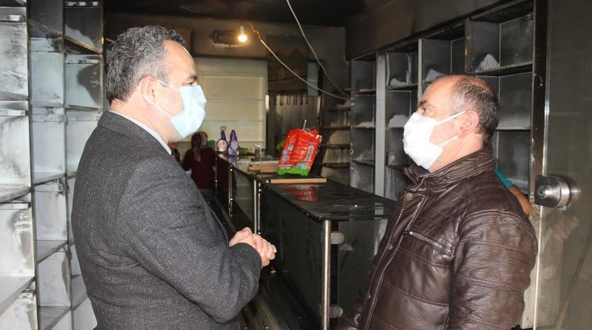 D&uuml;kkanı yanan esnafa Burhaniye Belediyesi destek oldu
