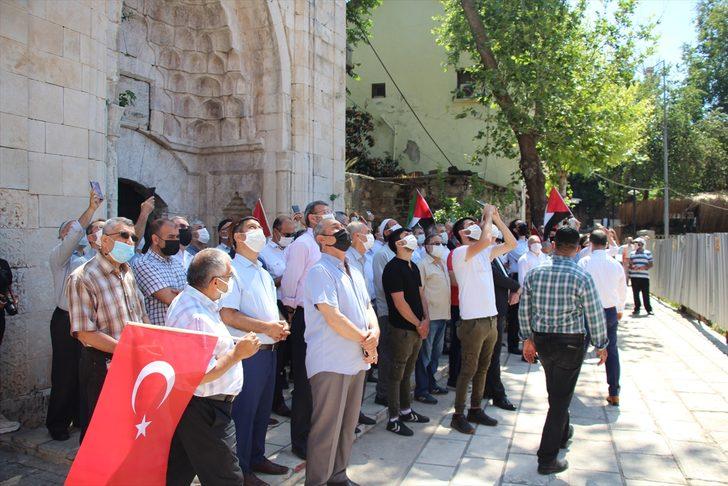 Antalya Kudüs Platformu üyeleri tarihi minareye Türk ve Filistin bayrağı astı G1