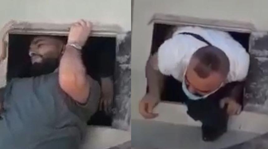 Çimento yüklü kamyonun gizli bölmesinde sınırı geçerken yakalandılar