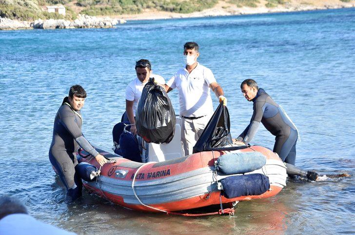 Muğla'da teknelerle ulaşılan plajda çevre ve deniz dibi temizliği yapıldı G5