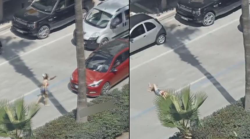 Akan trafiğin ortasında yola uzandı! "Pes" dedirten olay