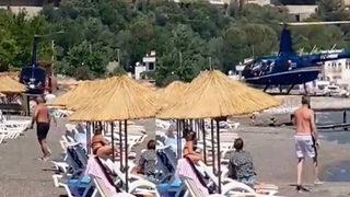 Marmaris'te halk plajına inen helikopter olay oldu! Bakanlık harekete geçti