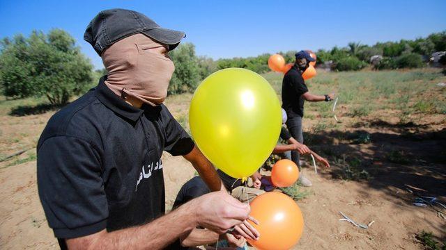 Doğu Kud&uuml;s teki  Bayrak y&uuml;r&uuml;y&uuml;ş&uuml;n&uuml;n  ardından gerilim arttı, İsrail Gazze yi vurdu 1