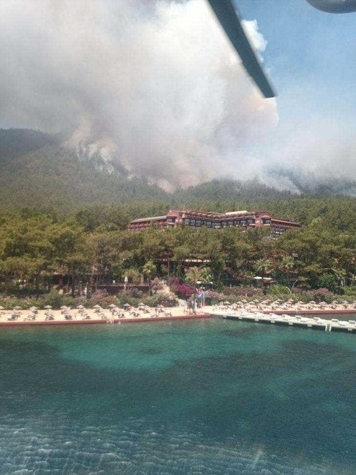 Marmaris'te oteller ve yerleşim yerlerine yakın ormanlık alanda yangın başladı G1