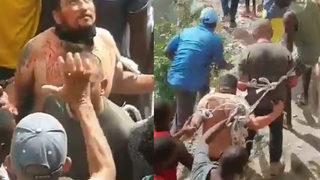 Haiti'de kaos! Ülkeden gelen fotoğraflar dehşete düşürdü, kanlar içinde sokak sokak gezdirdiler