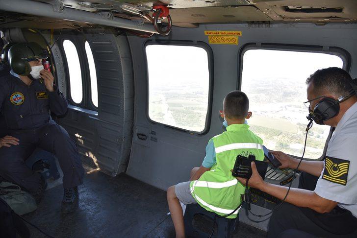 Kalbinde kitle olan 8 yaşındaki Ali'nin helikopterle uçma hayali gerçekleştirildi G1