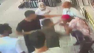 Gizlice kadınların fotoğrafını çeken kişiye meydan dayağı