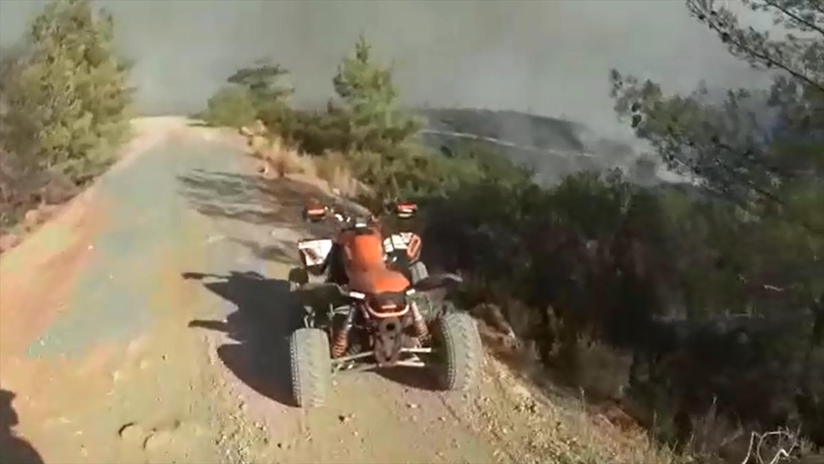 Bodrum'daki alevlere yangın s&ouml;nd&uuml;rme t&uuml;p&uuml;yle m&uuml;dahale aksiyon kamerasına yansıdı