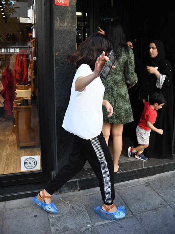 Makyajsız olduğu için panik yapan Nesrin Cavadzade, Arap turistlerin arkasına saklandı G3