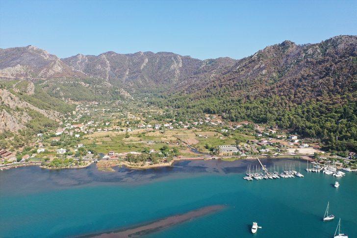 Marmaris'in önemli turizm bölgelerinden Kızkumu Plajı çevresinde yanan ormanlık alanlar havadan görüntülendi G2