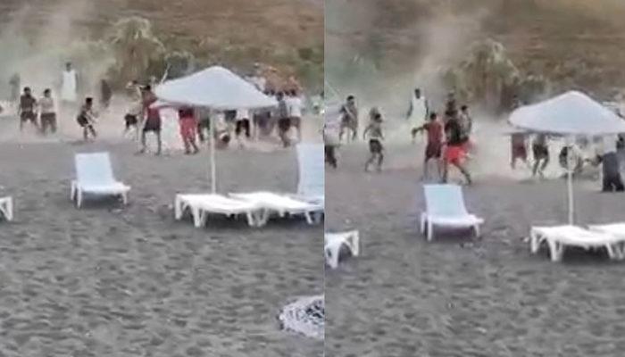 Antalya'daki ünlü sahilde kavga: Birbirlerine tekme ve sopalarla saldırdılar!