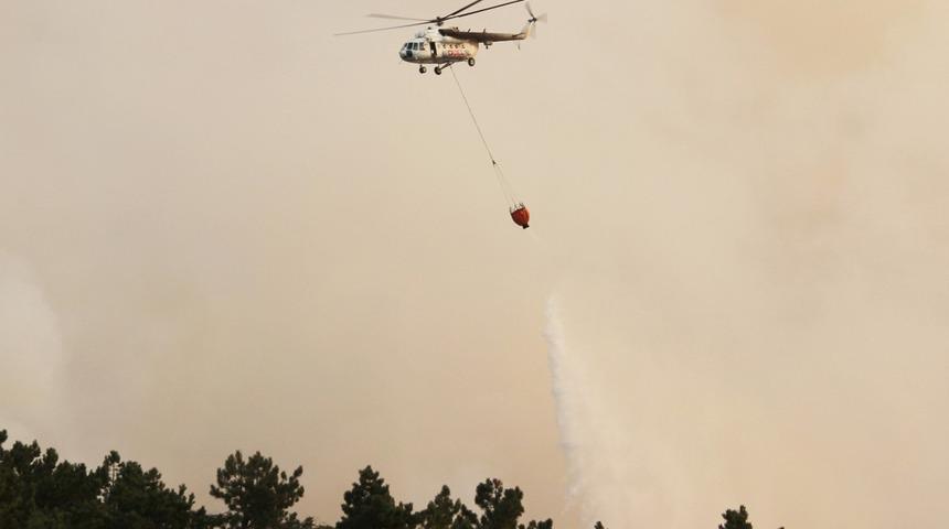 Çine’deki orman yangınına 12 helikopterle müdahale edildi