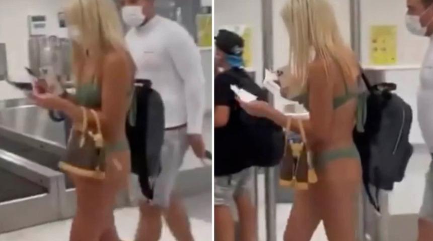 Havaalanında bikini ile yürüyen yolcu şaşkına çevirdi: En azından maske takıyor