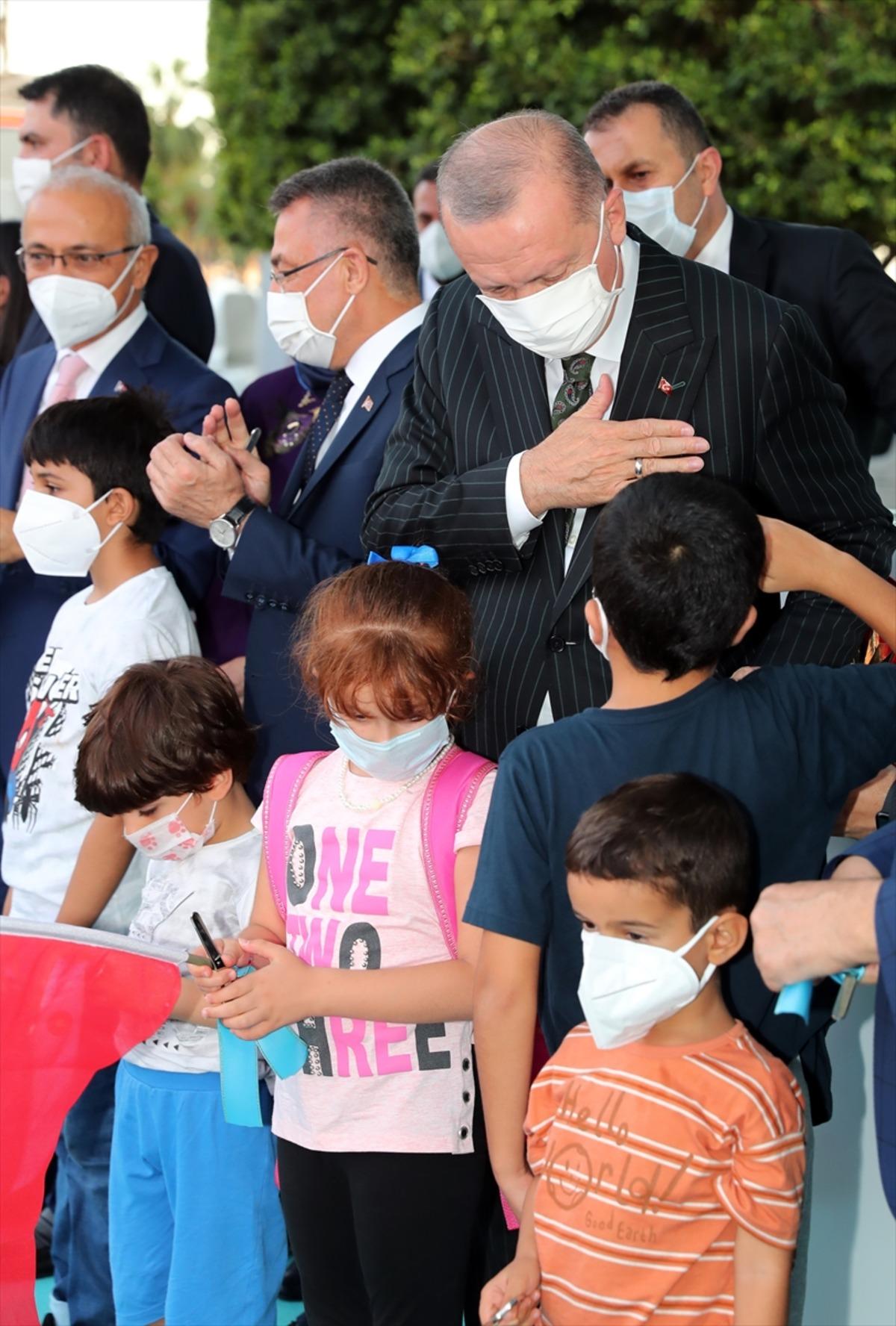 Cumhurbaşkanı Erdoğan, Mersin'de toplu a&ccedil;ılış t&ouml;reninde konuştu: (1)