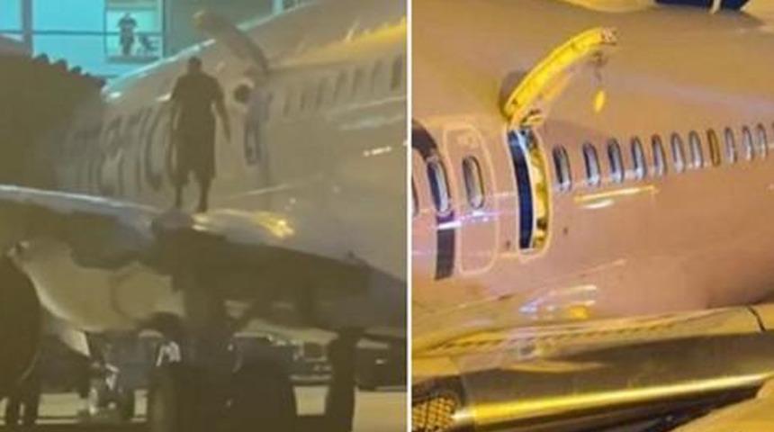 Hareket halindeki uçağın acil kapısından kanadına çıktı