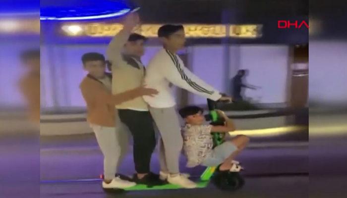 Antalya'da şaşkına çeviren anlar! Elektrikli scootera 4 kişi bindiler