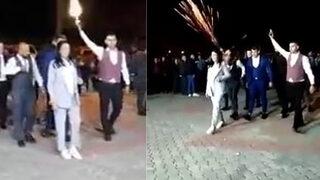 Kurtlar Vadisi müziği eşliğinde silah atarak takı törenine girmişlerdi